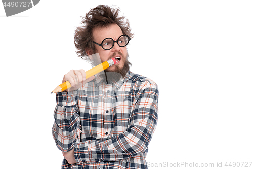 Image of Crazy bearded man with big pencil