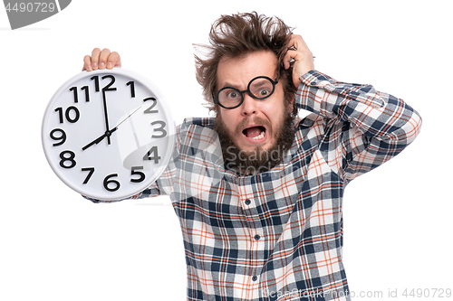 Image of Crazy bearded man with big clock