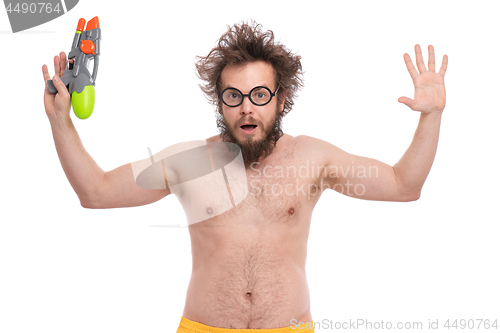 Image of Crazy bearded man - beach concept