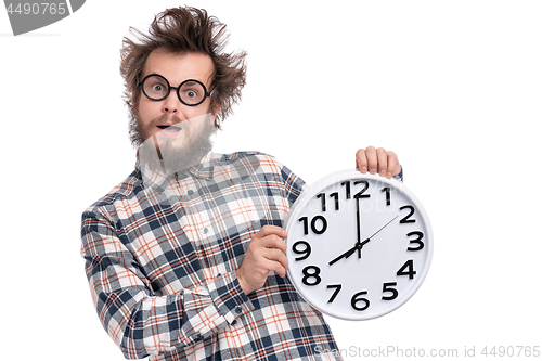 Image of Crazy bearded man with big clock