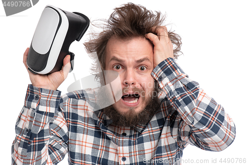 Image of Crazy bearded man with VR goggles