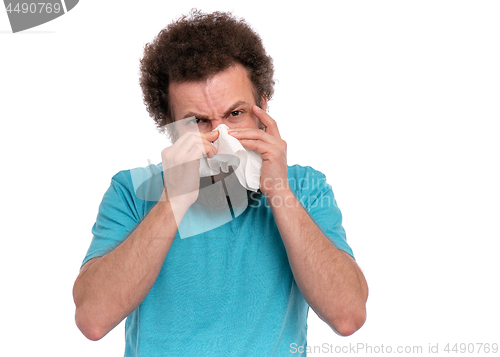 Image of Crazy bearded man has runny nose