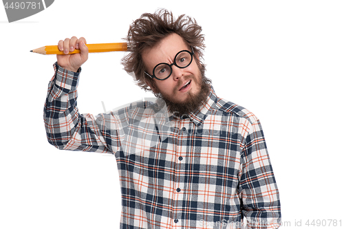 Image of Crazy bearded man with big pencil