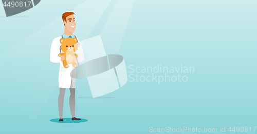 Image of Pediatrician doctor holding teddy bear.