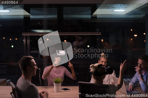 Image of Multiethnic Business team using virtual reality headset