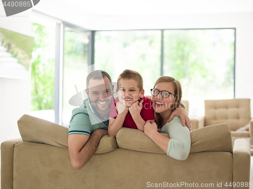 Image of family with little boy enjoys in the modern living room