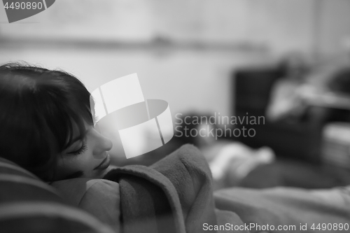 Image of software developers sleeping on sofa in creative startup office
