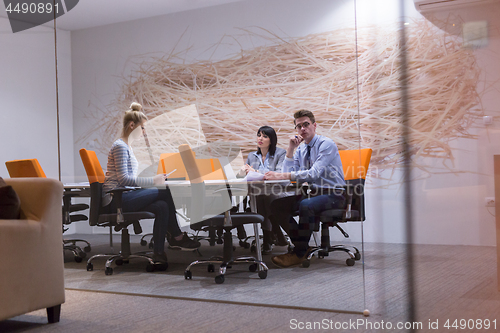 Image of Business Team At A Meeting at modern office building