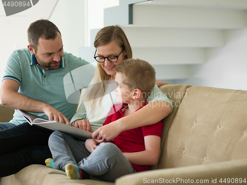 Image of family with little boy enjoys in the modern living room