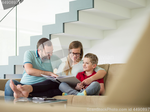 Image of family with little boy enjoys in the modern living room