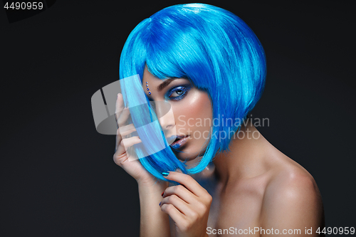 Image of Beautiful girl in blue wig