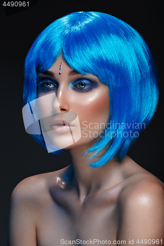 Image of Beautiful girl in blue wig