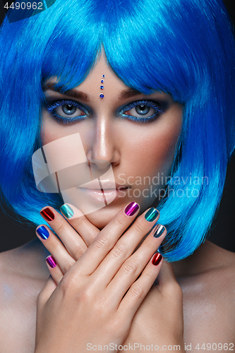 Image of Beautiful girl in blue wig