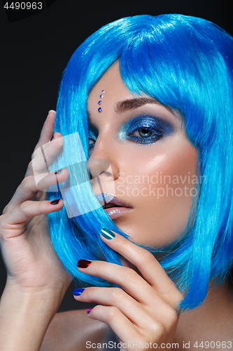 Image of Beautiful girl in blue wig