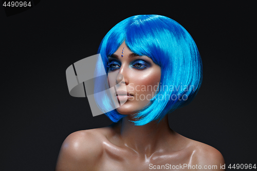 Image of Beautiful girl in blue wig