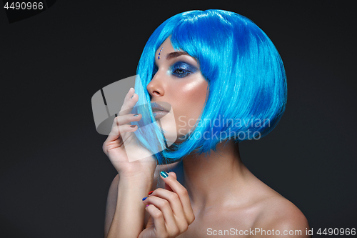 Image of Beautiful girl in blue wig