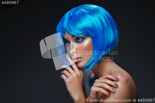 Image of Beautiful girl in blue wig