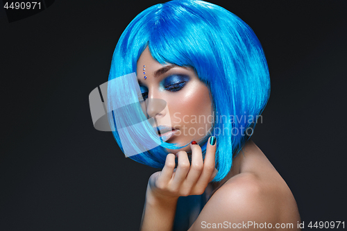 Image of Beautiful girl in blue wig
