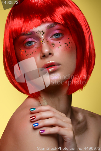 Image of Beautiful girl in red wig