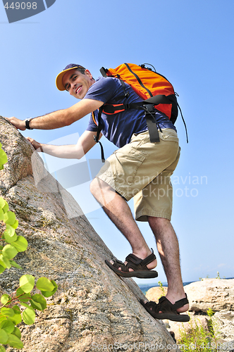 Image of Man climbing