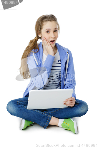 Image of Teen age girl with tablet