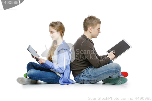 Image of Teen boy and girl taking selfie photo