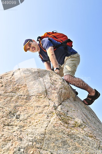 Image of Man climbing