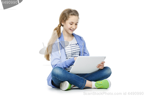 Image of Teen age girl with tablet