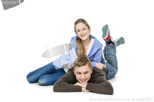 Image of Teen boy and girl taking selfie photo