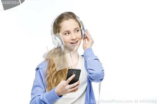 Image of Teen age girl with headphones