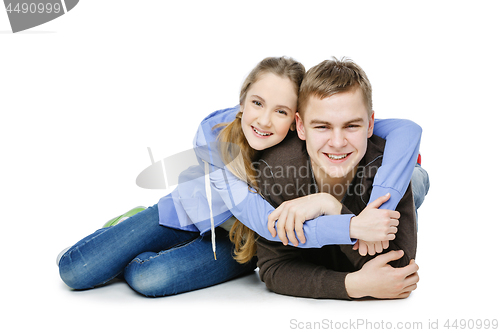Image of Teen boy and girl taking selfie photo