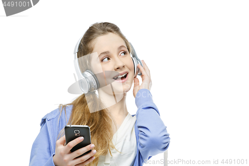 Image of Teen age girl with headphones