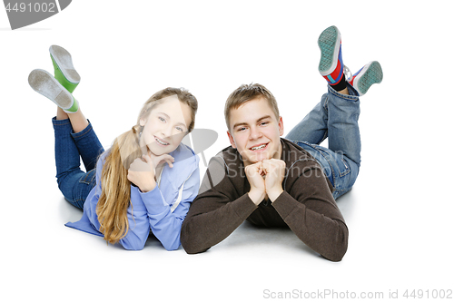 Image of Teen boy and girl taking selfie photo