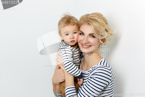Image of Beautiful young woman with toddler