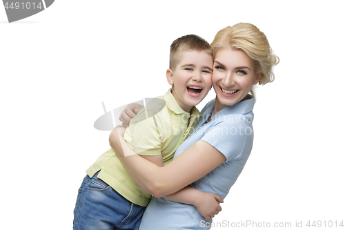 Image of Young mother hugging son
