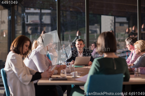 Image of Business Team At A Meeting at modern office building