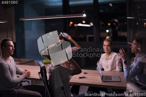 Image of Multiethnic Business team using virtual reality headset