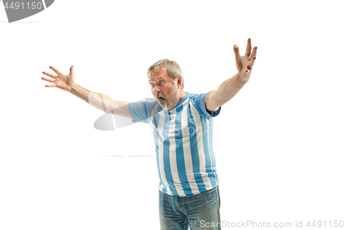 Image of The Argentinean soccer fan celebrating on white background