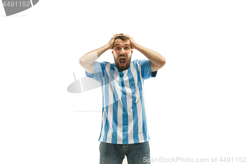 Image of The unhappy and sad Argentinean fan on white background