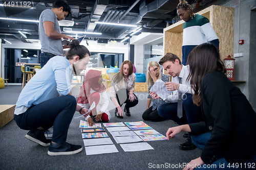 Image of black muslim woman having meeting with Multiethnic  startup busi