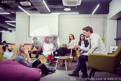 Image of Multiethnic startup business team having meeting