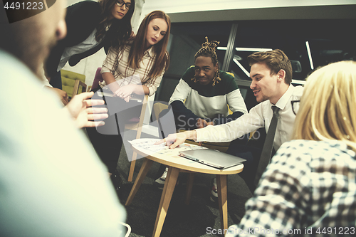 Image of Multiethnic startup business team having meeting