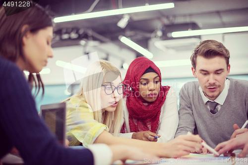 Image of Multiethnic startup business team having meeting