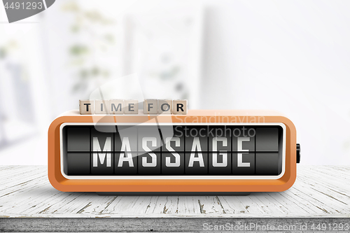 Image of Time for massage message on a retro clock