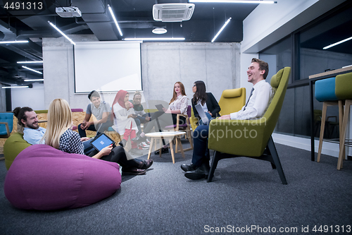 Image of Multiethnic startup business team having meeting