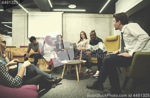 Image of Multiethnic startup business team having meeting