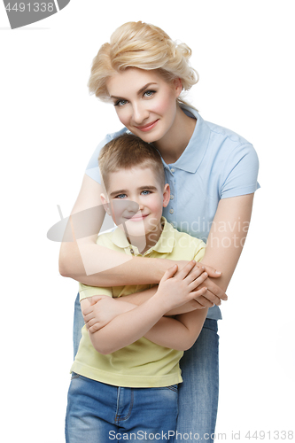 Image of Young mother hugging son