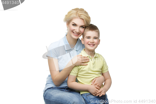 Image of Young mother hugging son