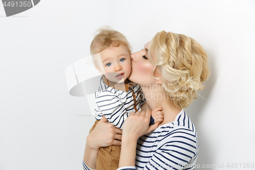 Image of Beautiful young woman with toddler