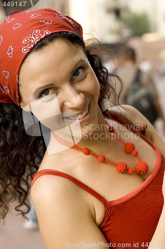 Image of happy woman in red